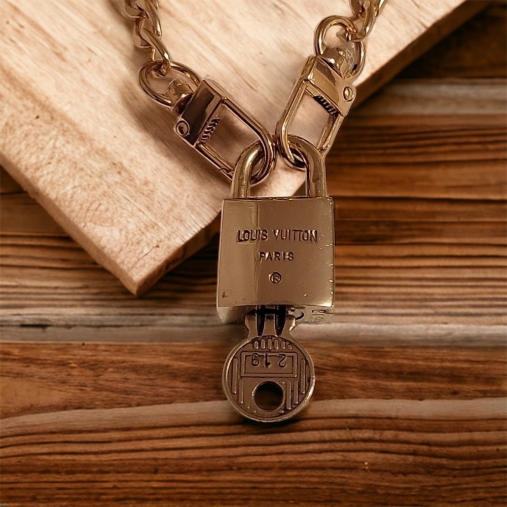 Vintage Louis Vuitton #219 & #217 lock and key on unbranded necklace